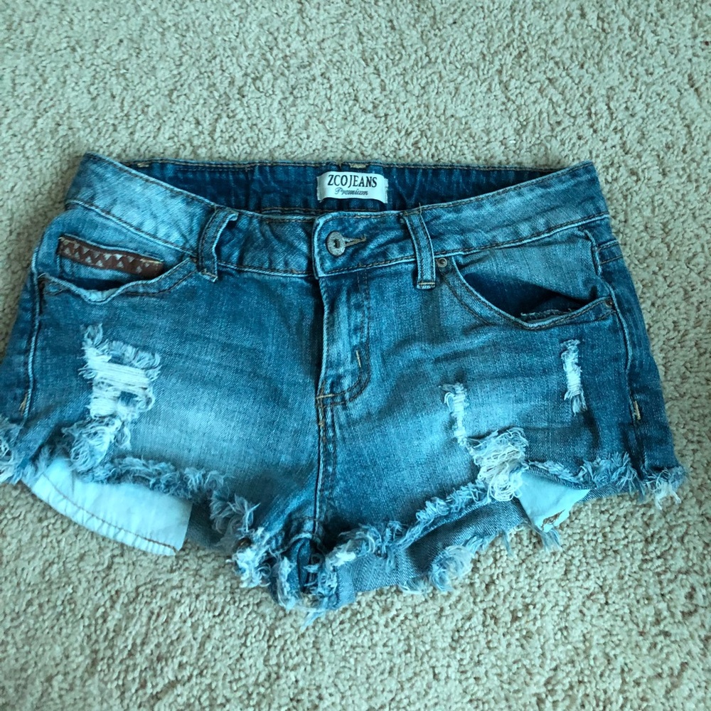 ZCO light wash distressed jeans